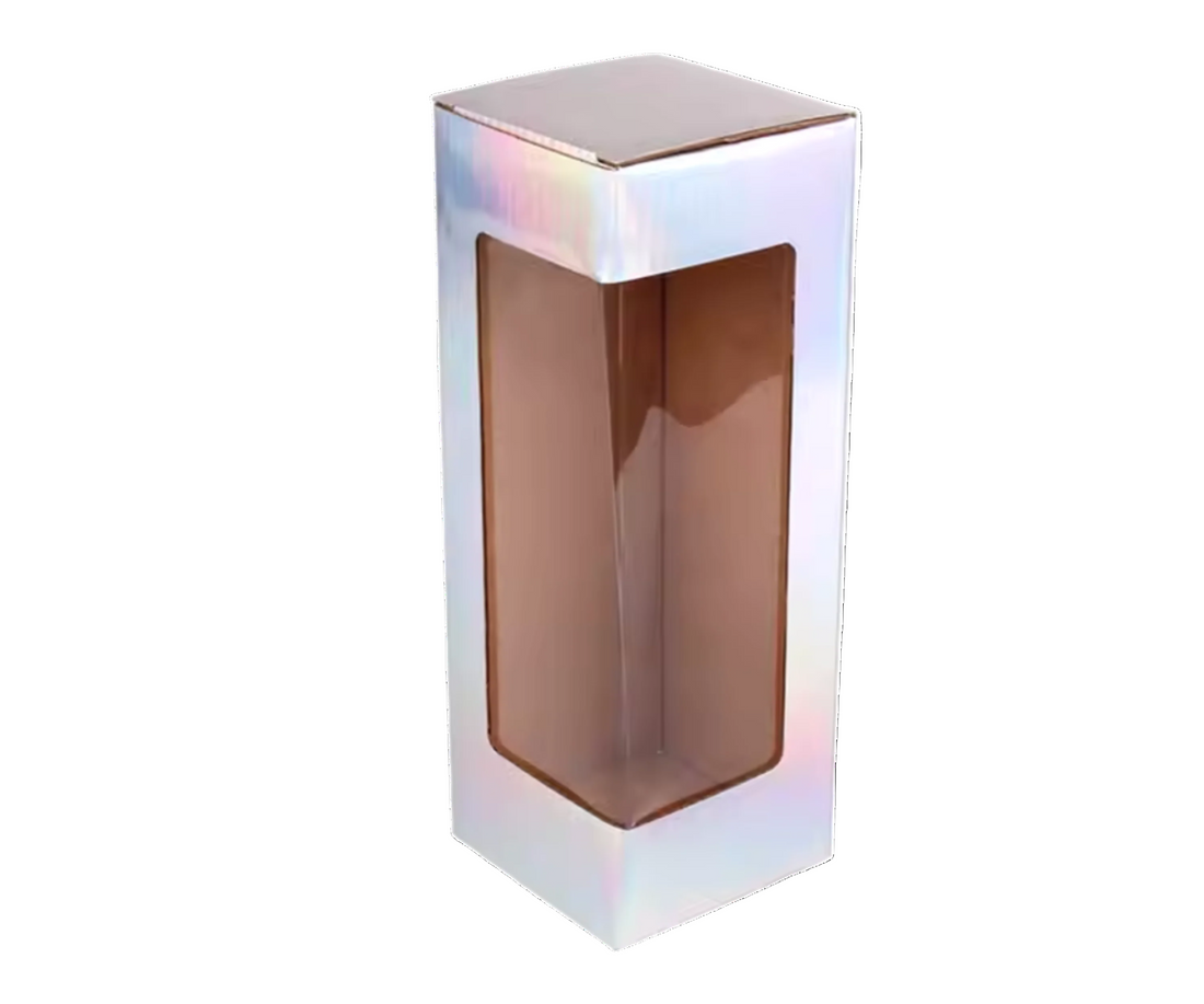 A holographic, glossy laminated corrugated cardboard tumbler box with a clear window on a 20oz tumbler.